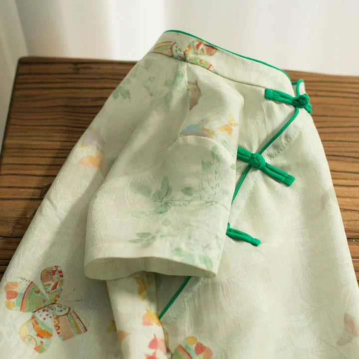 MINT SLEEVELESS LINEN BUTTERFLY TUNIC