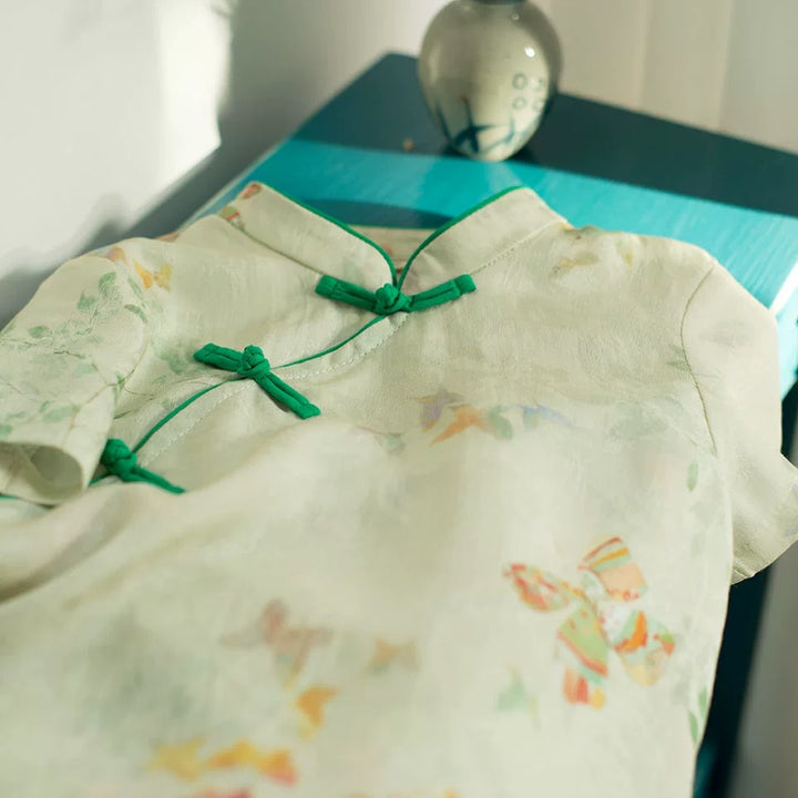 MINT SLEEVELESS LINEN BUTTERFLY TUNIC