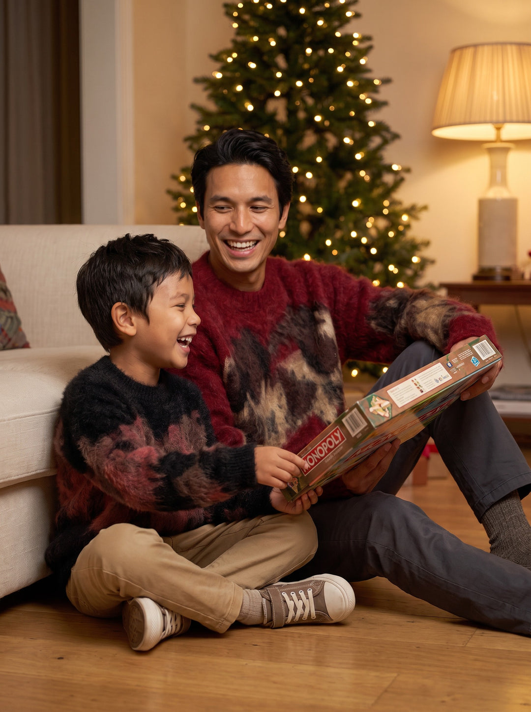 Xu Beihong Galloping Horse Family Sweater 徐悲鸿联名大展鸿图毛衣 – dad in Red 年衣红 and son in Black 河豚黑 at home