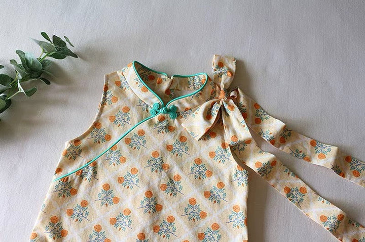SLEEVELESS SUMMER DRESS WITH TIED BOW